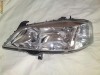 Far Opel Astra G Hella (ORIGINAL) partea stanga