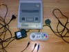 Vand 1 consola SNES, 3 manete wireless, 7 casete ( super nintendo, paperboy, mario, fifa star trek, KILLER INSTINCT)