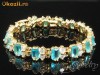 Bratara placata cu aur de 18k, cu cristale light sapphire oval cut si cristale swarovski clear- bijuterii mireasa
