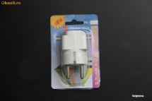 Adaptor priza de la sitemul european la cel englesesc, cel american, etc.