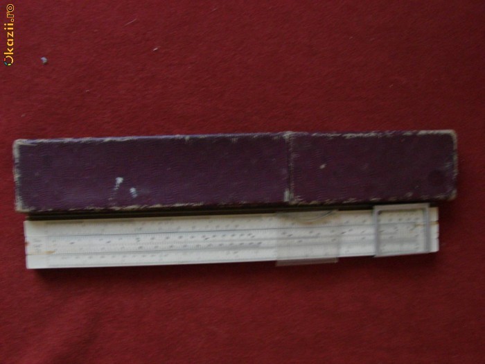 RIGLA DE CALCUL 25 CM RUSEASCA CU CUTIE foto mare