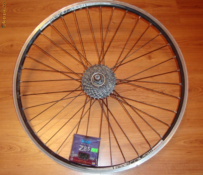ROATA BICICLETA 26+AX+PINIOANE PE FILET foto mare