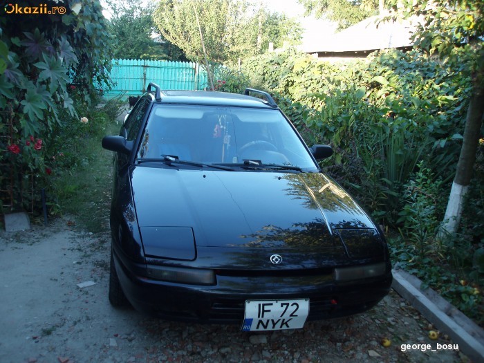 VIND/SCHIMB MAZDA 323F foto mare